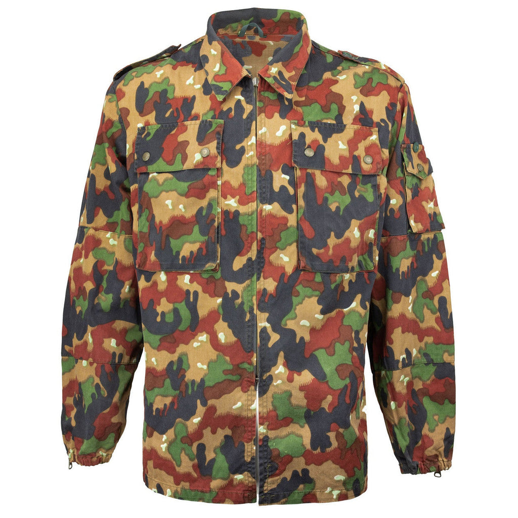 Swiss M83 Alpenflage Field Jacket with iconic six-color TAZ 83 camouflage, durable cotton/poly blend, and zippered sleeves for outdoor adventures.