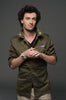 Star Collar Army Green Shirt with vintage military aesthetic, 70s and 80s style, cotton construction, reinforced elbows, and star details on collar ends.