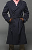 Military style navy blue gabardine trench coat with belt, double-breasted, epaulettes, and slanted pockets.
