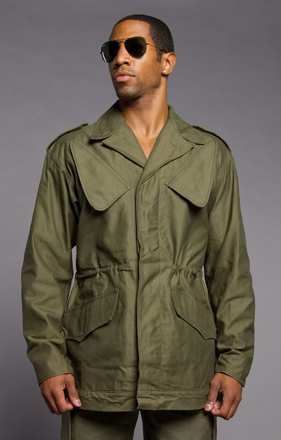 Olive green Slant Pocket Army Field Jacket with epaulettes and slant pockets.