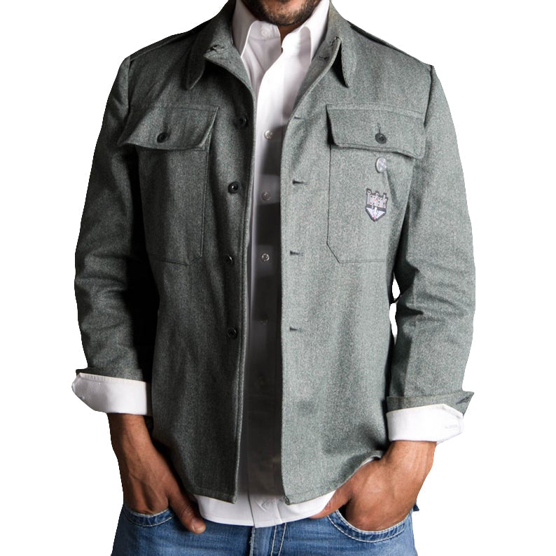 Vintage jean jacket from Switzerland, 1980s rugged style, epaulettes, deep front pockets, made of 100% denim cotton.