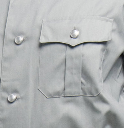 Gray cropped button-up shirt with aluminum metal buttons and military-style pocket detail