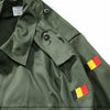 Green military-style shirt with Belgian flags on a white background