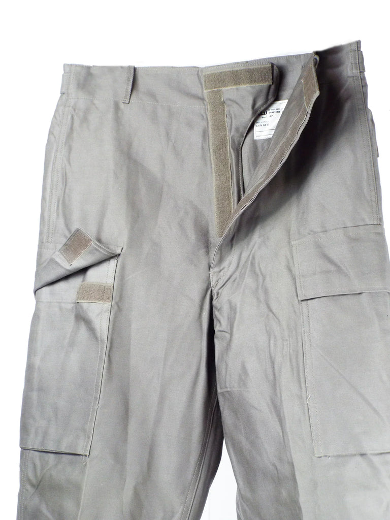1970s Dutch Military gray chino cargo pants with Velcro pockets and zip-up design.