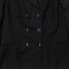 Close-up of a black coat with button details
