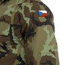 Camouflage jacket with a flag patch on a white background