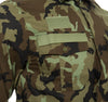 Close-up of a camouflage jacket with a patch on a white background