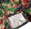 Camouflage fabric with a label showing size 52 on a white background