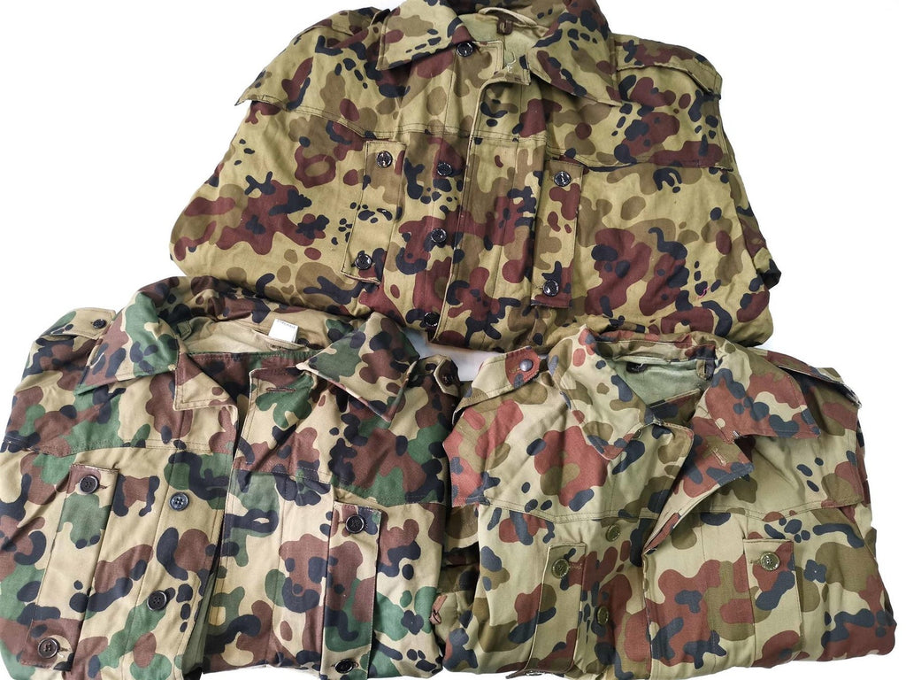 1990s Romanian military camo parkas with various camouflage patterns.