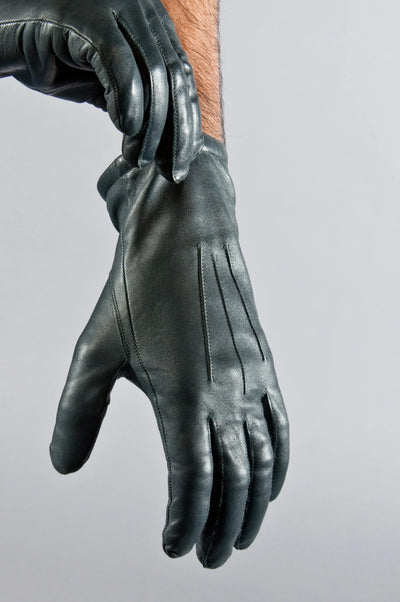 Blue Gray leather gloves on a gray background